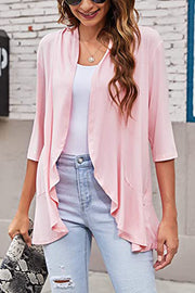 Blush pink cardigan with asymmetrical ruffle hem and 3/4 sleeves, open front.