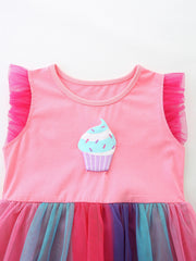 Pink cotton dress with cupcake graphic and ruffled tulle sleeves, rainbow tulle skirt.