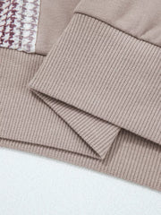 Relaxed fit cotton hoodie in taupe with textured knit detail on the chest and ribbed cuffs.