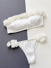 White textured bandeau bikini set with ruffle and floral applique details