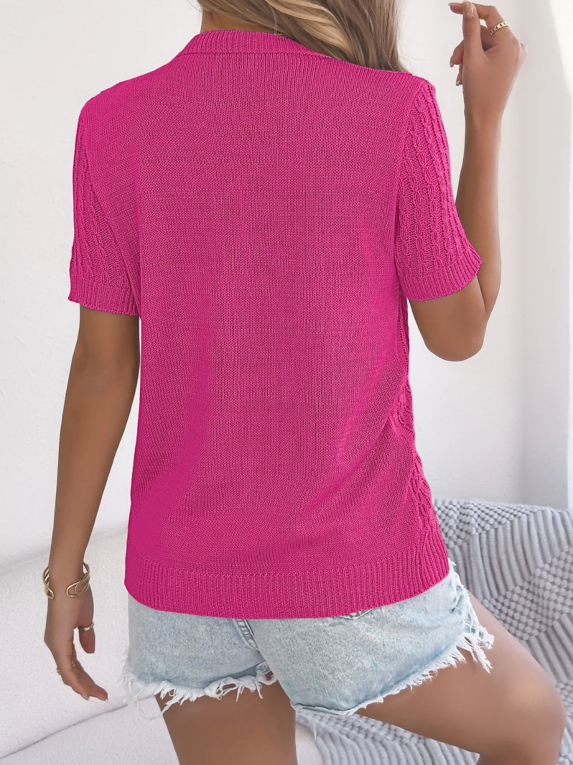 Hot Pink textured knit button-front top with cable knit sleeves and collar.