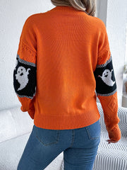 Orange crewneck sweater with ghost motif on sleeves, cable knit details, acrylic blend.