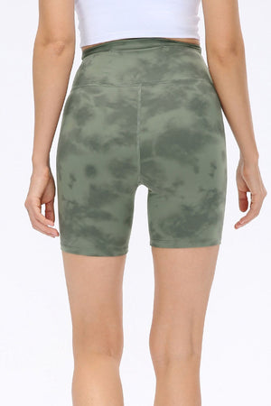 Matcha green tie-dye bike shorts with a high waist