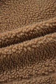 Brown sherpa jacket lining detail, soft fuzzy texture