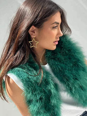 Gold starburst drop earrings with a celestial design.