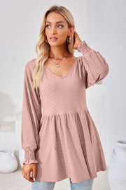 Dusty Pink textured babydoll blouse with v-neck and smocked cuffs