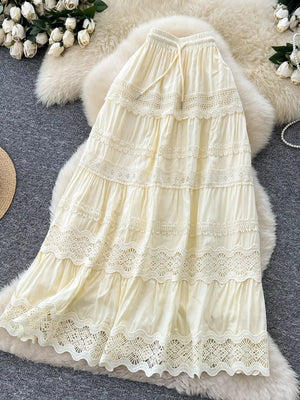 Apricot tiered maxi skirt with lace trim and drawstring waist
