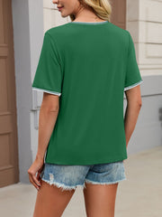Green short sleeve t-shirt with contrast trim neckline and cuffs.