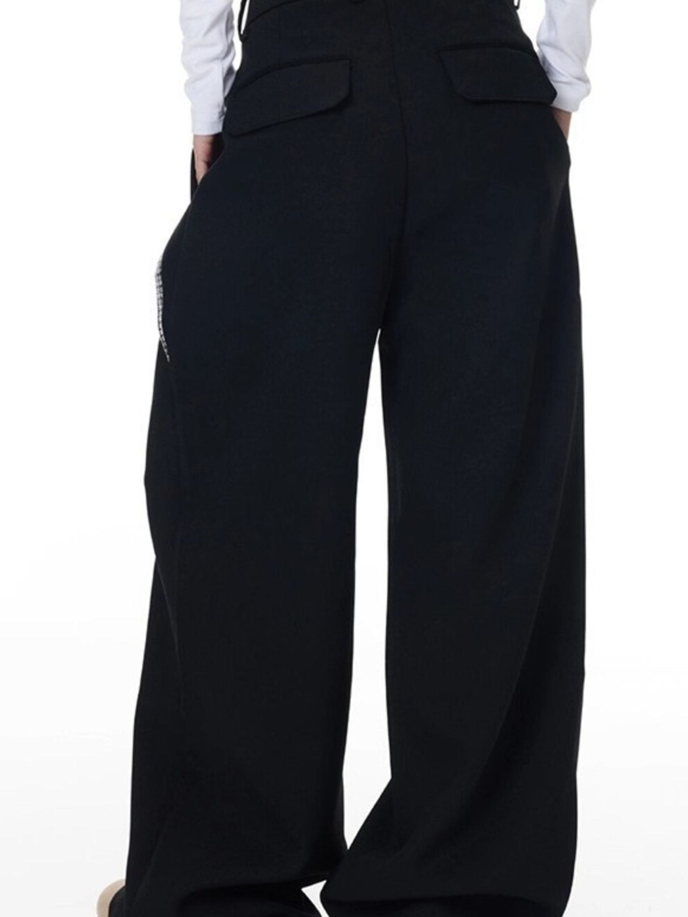 Men's black cotton wide-leg trousers with braided cord detail and back pockets.