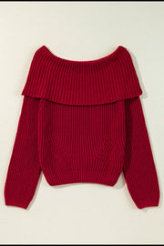 Deep red acrylic off-the-shoulder sweater with ribbed texture and a wide collar detail.