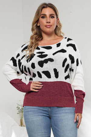 Dalmatian print colorblock knit sweater with wine and white panels.