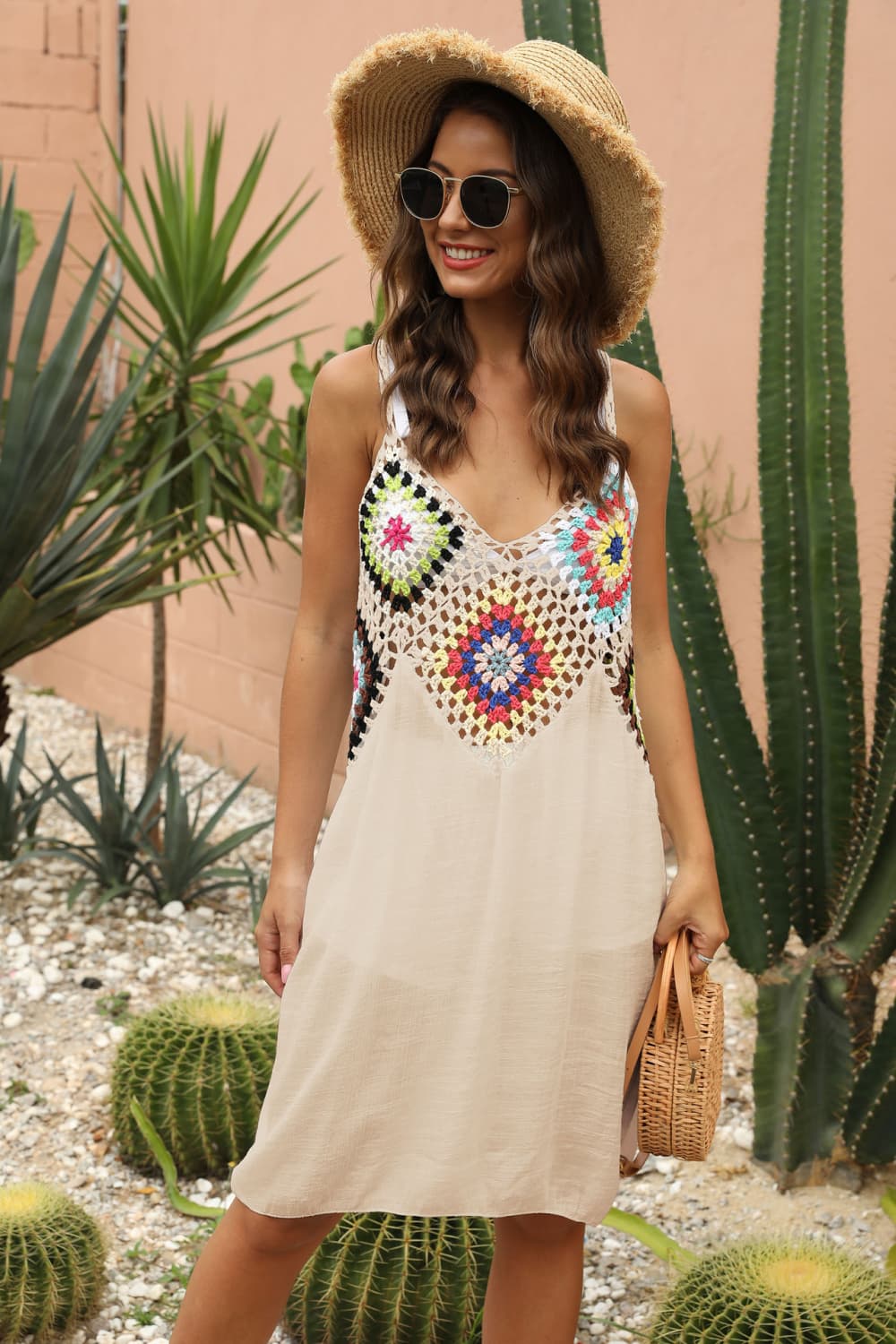 Apricot crochet yoke maxi dress with colorful floral squares and a flowing skirt.