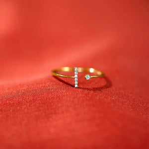 Gold bar and dot ring with clear stones, 18K gold-plated