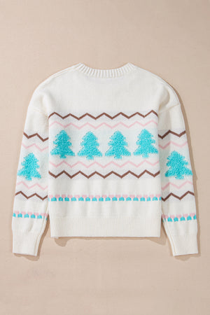 White knit sweater with textured tree motif and zigzag stripes.