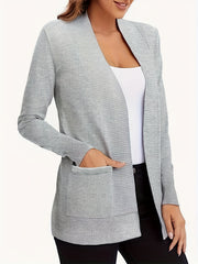 Gray textured knit open-front cardigan with pockets and ribbed details.