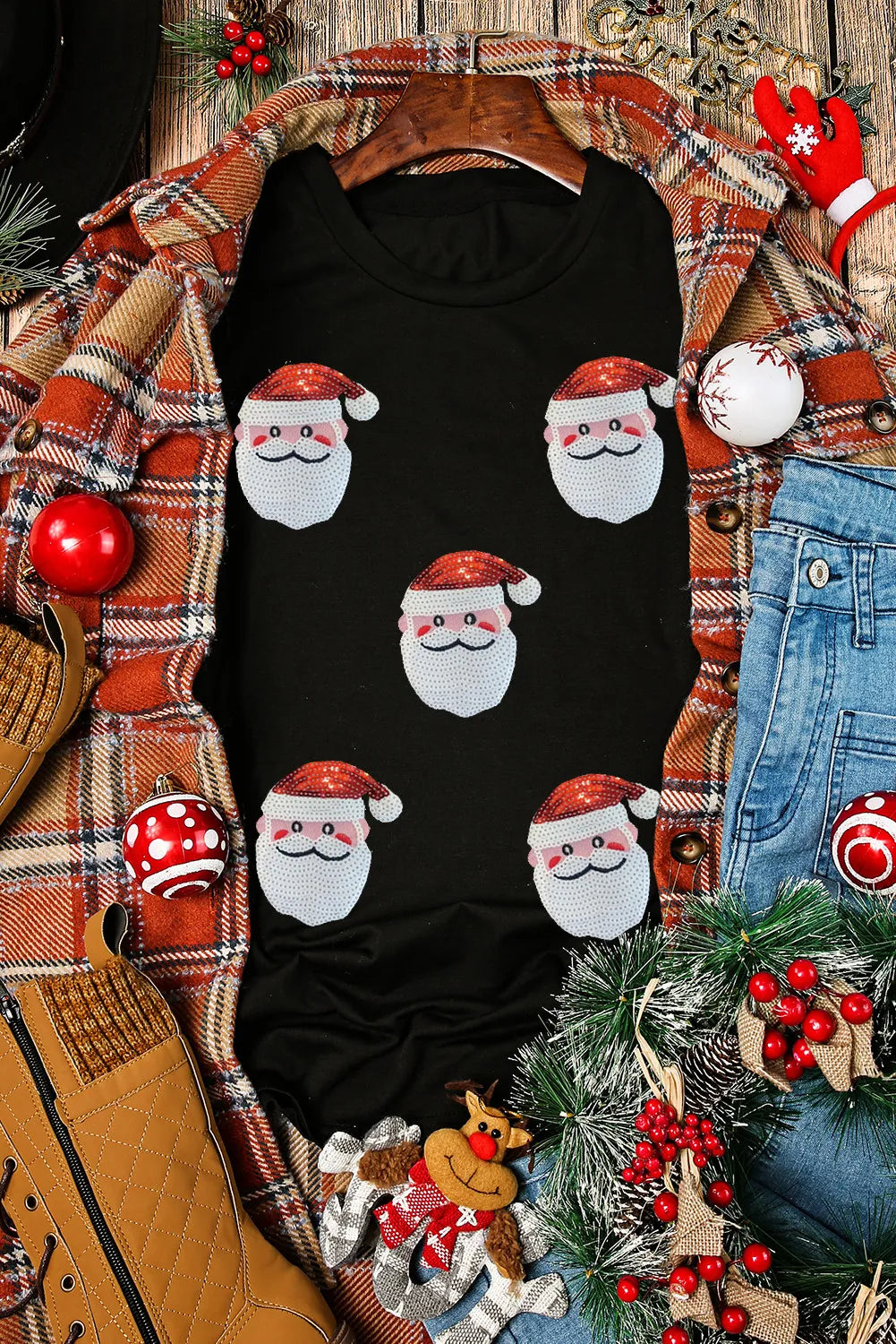 Black cotton t-shirt with all-over Santa sequin motif, crew neck, short sleeves.