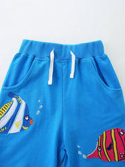 Blue cotton toddler shorts with fish embroidery and drawstring waist