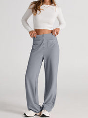 Gray button-front palazzo trousers with flap pockets and a wide leg.