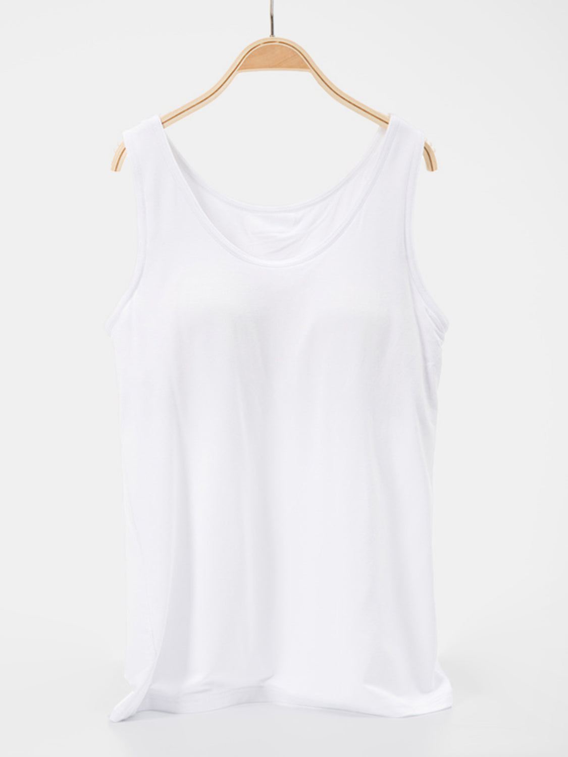 White essential scoop neck tank top with a relaxed fit.