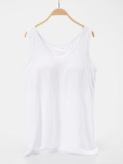 White essential scoop neck tank top with a relaxed fit.