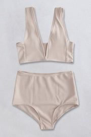 Cream ribbed high-waist plunge bikini set with a textured finish.