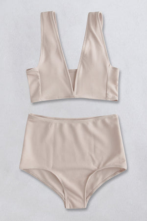 Cream ribbed high-waist plunge bikini set with a textured finish.