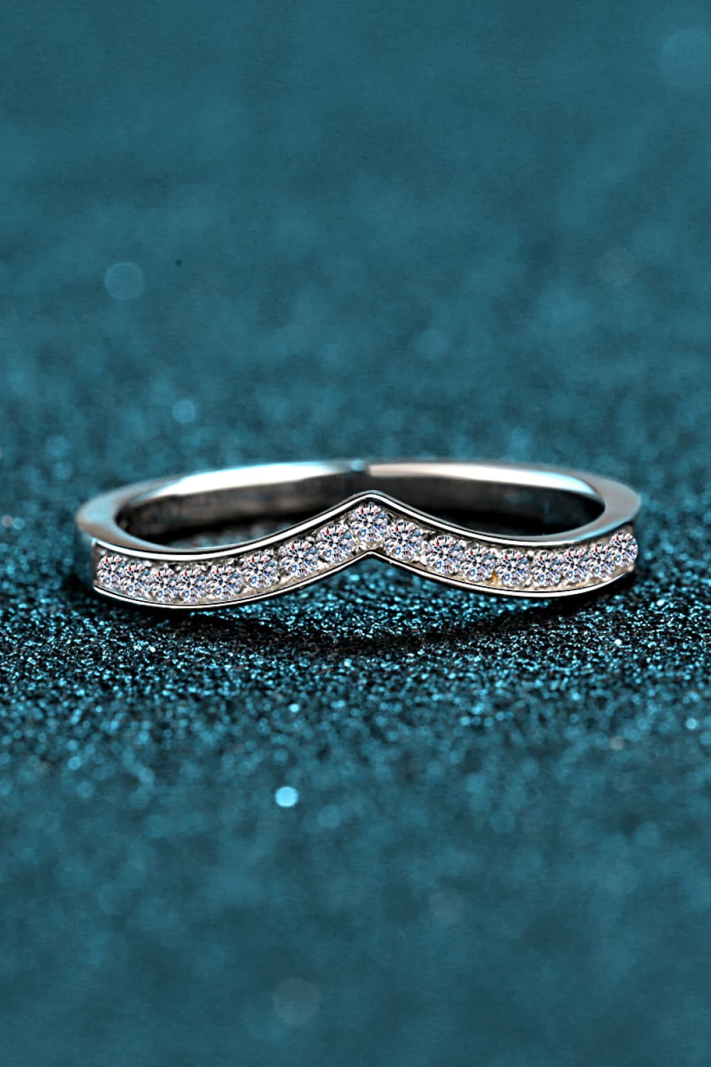 Chevron pavé rhodium band ring with clear stones in silver.