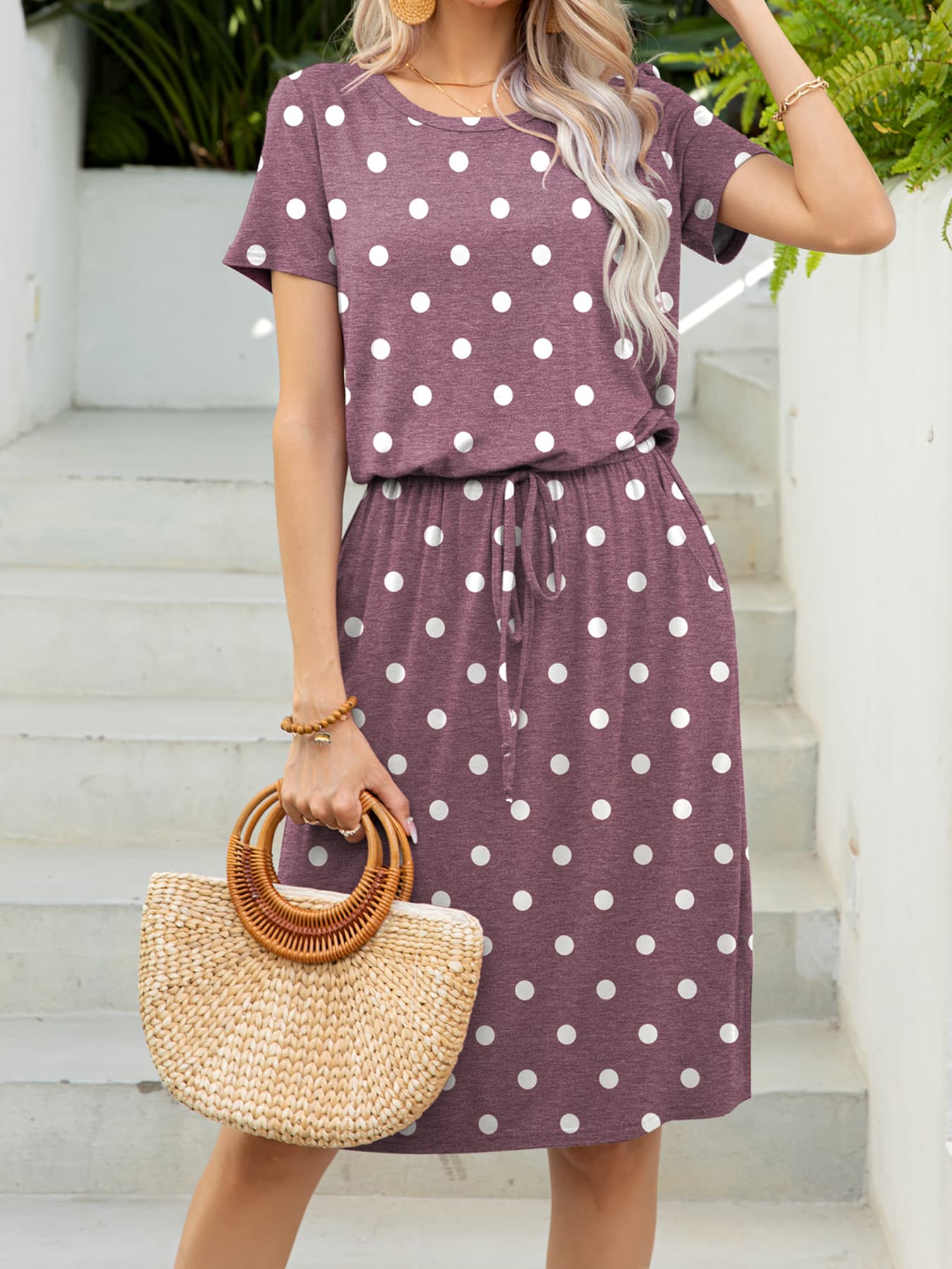 Drawstring waist midi dress in Moonlit Mauve with white polka dots, short sleeves, and pockets.