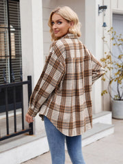 Oversized plaid shirt jacket in chocolate brown with buttoned front and pocket detail.