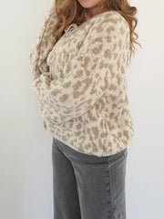 Khaki leopard print tie-front cropped cardigan with long sleeves.