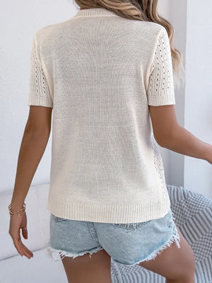 Cream knit short sleeve cardigan with eyelet detail on sleeves and sides