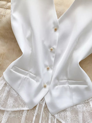 White button-down vest coat with lace trim and pocket details