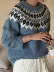 French blue acrylic sweater with a fair isle yoke pattern and round neck.