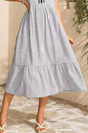 Striped midi dress with ruffle hem and sleeveless design