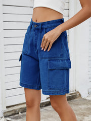 Utility denim Bermuda shorts in dark blue with cargo pockets and a casual cut.