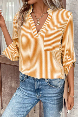 Gold vertical stripe V-neck blouse with roll-tab sleeves and chest pocket.