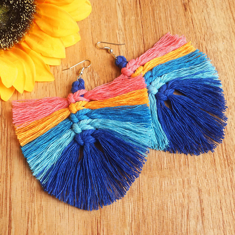 Rainbow fan tassel earrings with pink, orange, light blue, and dark blue threads.