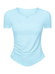 Pastel blue ribbed notch-neck active top with ruched side detail