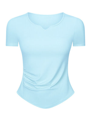 Pastel blue ribbed notch-neck active top with ruched side detail