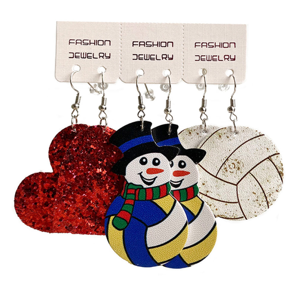 Festive sports trio earrings set with red glitter heart, snowmen, and volleyball designs.