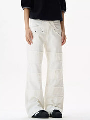 White stretch flare jeans with frayed hem detail and panel construction.