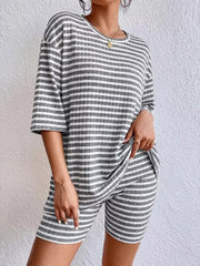 Gray striped two-piece set with elbow sleeve top and shorts.