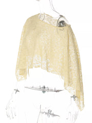 Yellow sheer one-shoulder cropped lace cardigan with an asymmetrical hem.