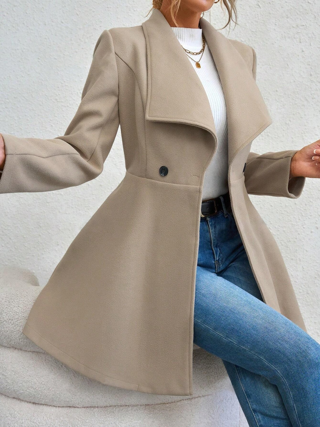 Dust Storm draped collar flare-hem coat with a single button closure.