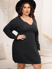 Sculpted knit midi dress in charcoal with a V-neck and long sleeves.