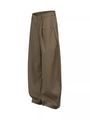 Brown pleated front wide-leg trousers with adjustable waist and button closure.
