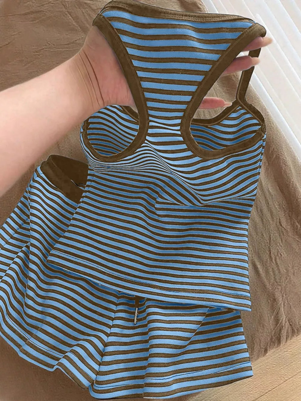 Blue striped tank top and shorts set with brown trim and drawstring shorts.