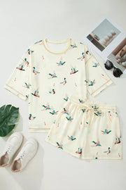 Beige mallard duck print pajama set with crew neck top and drawstring shorts.
