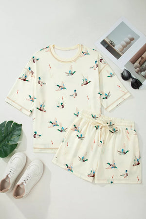 Beige mallard duck print pajama set with crew neck top and drawstring shorts.