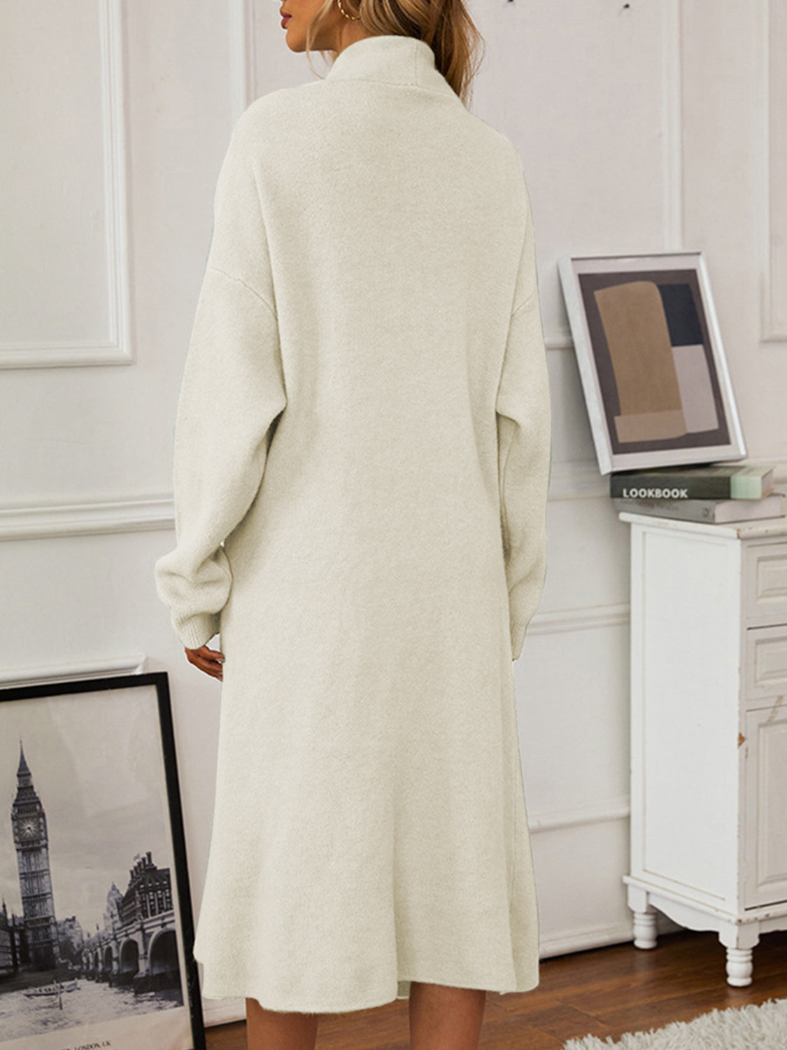 Cream ribbed knit midi dress with mock neck and long sleeves.